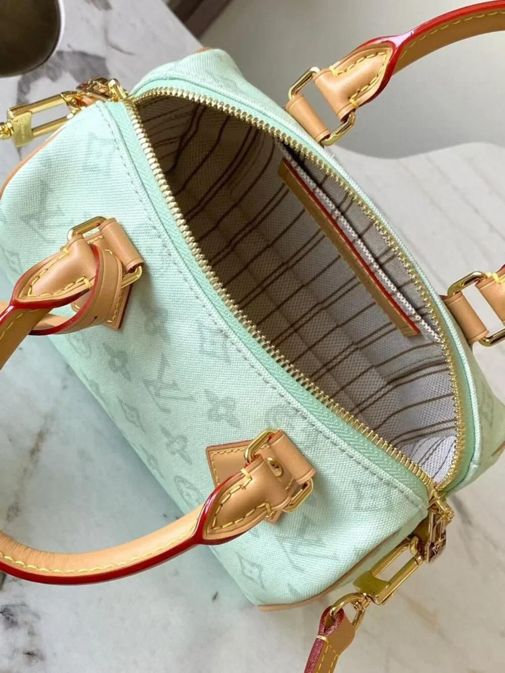 Louis Vuitton please see